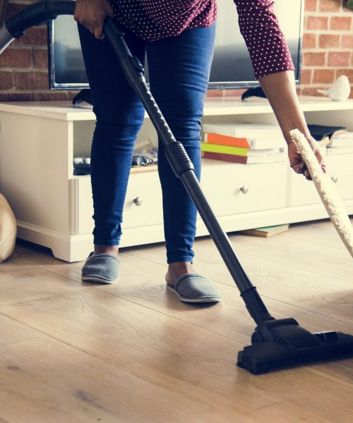 Black woman is cleaning room Black woman is cleaning room